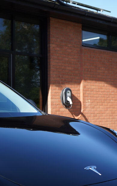 tesla ev charger and solar panels