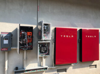 Forme Solar two red tesla powerwalls installed california battery smart